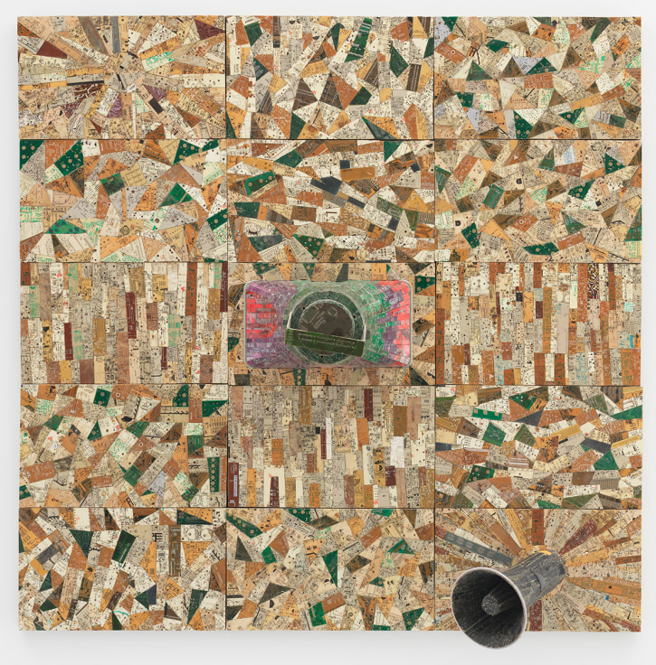 two megaphones emerging from a surface composed of electrical wires  and components