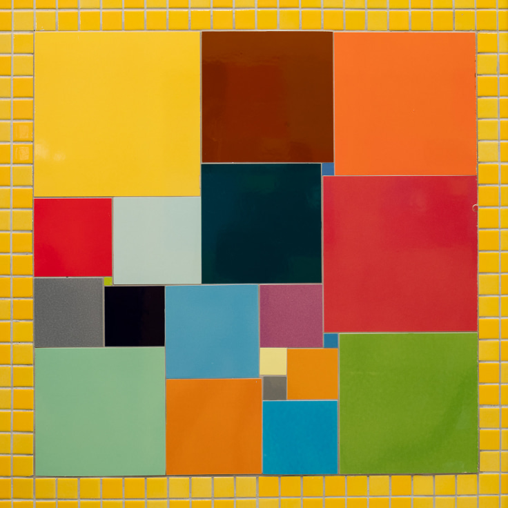 Colored Ceramic Squares on Yellow Ceramic Background.
