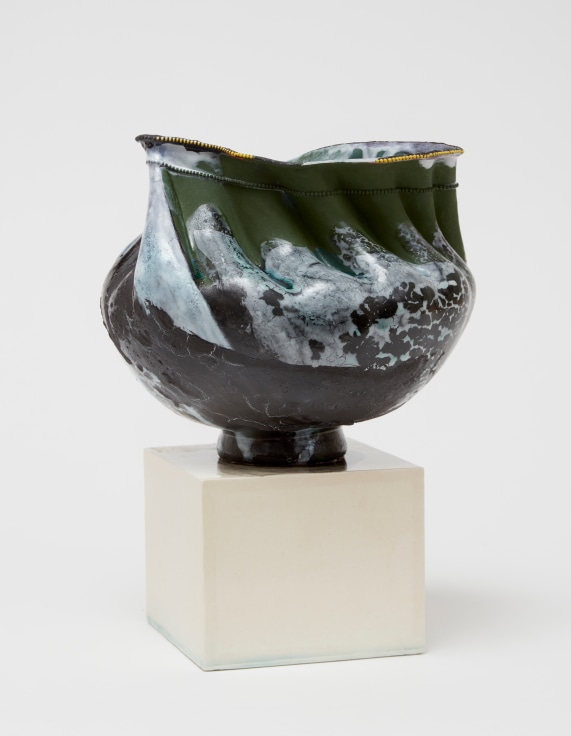 Wide porcelain pot with narrow base, cerated rim, and ridged sides by Kathy Butterly.