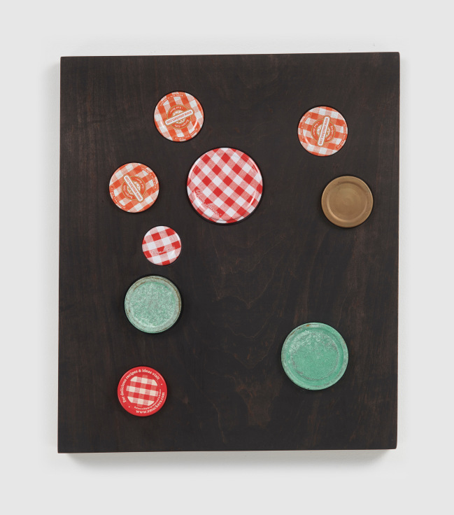Bronze, patinated bronze and found jam jar lids in relief on solid soft maple wood panel