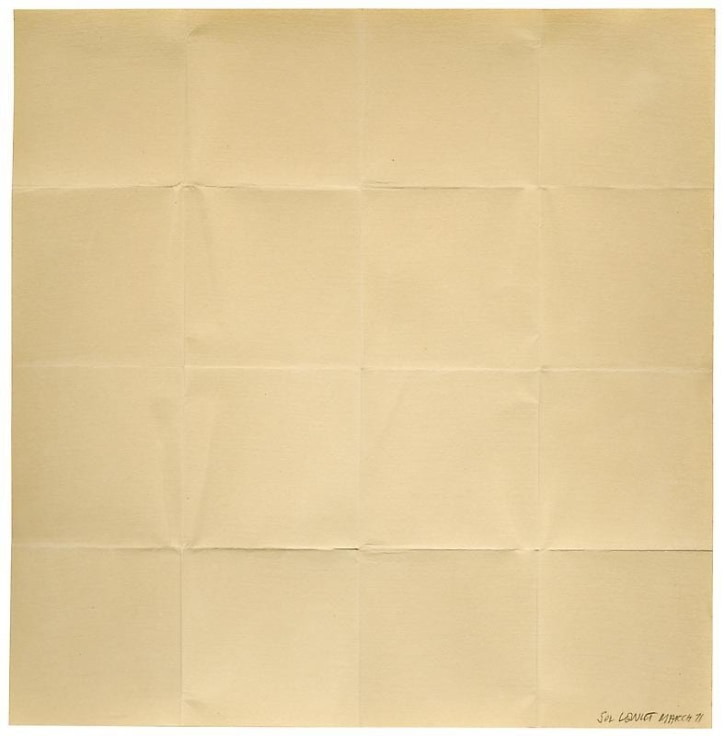 piece of paper that was noticeably folded into a small square before being unfolded