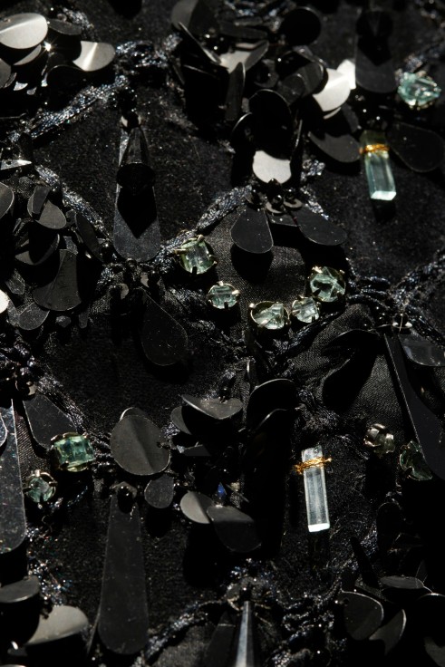 close up of black dress's beading