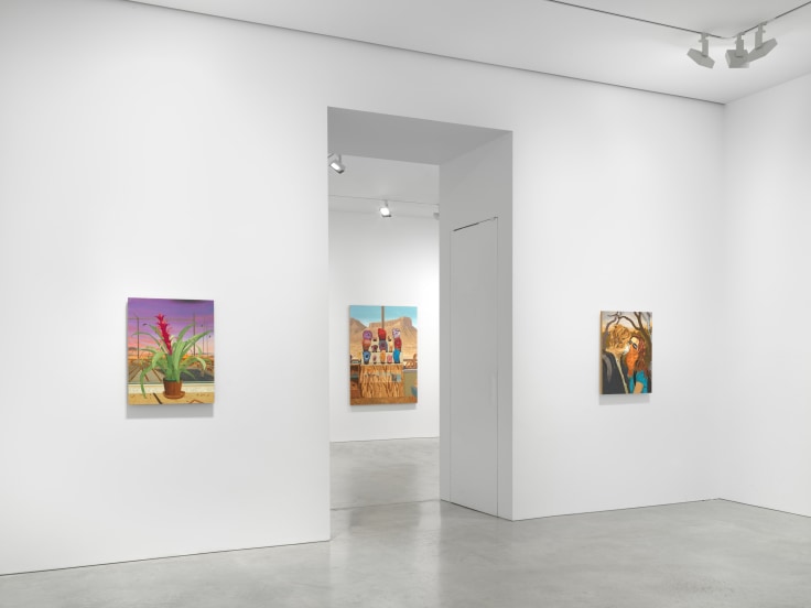 gallery view of two artworks with an entry way to the next room in the middle
