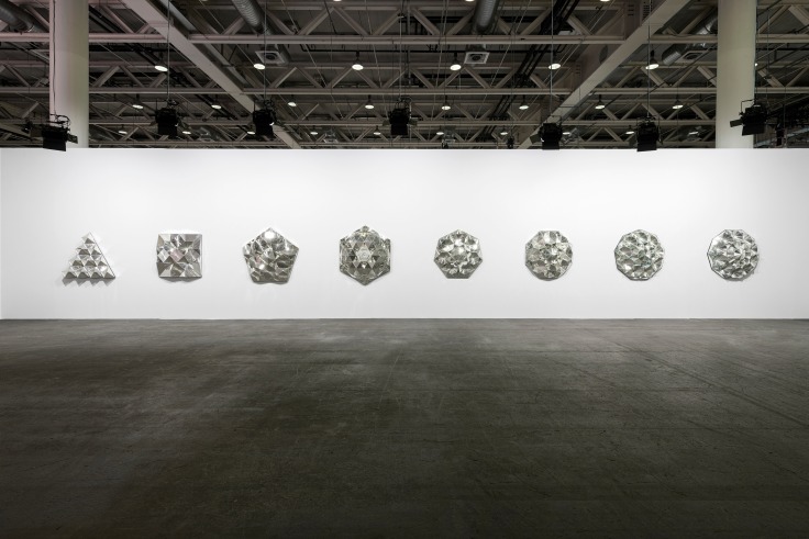 Installation view, Monir Shahroudy Farmanfarmaian,&nbsp;Third Family, 2011,&nbsp;Series of 8 sculptures, Reverse painted glass, mirrored glass, and plaster, Dimensions variable, Art Basel Unlimited, Switzerland