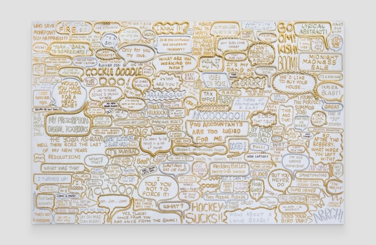 A white rectangular board featuring several quotes made of stainless steel