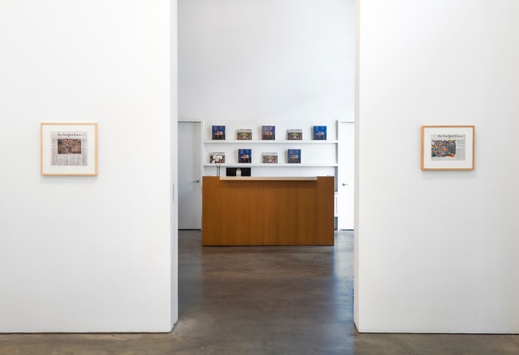 installation view of two artworks with doorway leading to he gallery's reception area in the middle