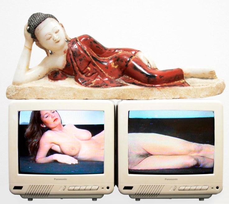 , NAM JUNE PAIK&nbsp;Reclining Buddha,&nbsp;1994&nbsp;2 color televisions, 2 Pioneer laser disk players, 2 original Paik laser disks, found object &#039;buddha&#039;&nbsp;20 x 24 x 14 in. (50.8 x 60.96 x 35.56 cm)