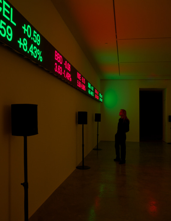 person observing the display showing stock information