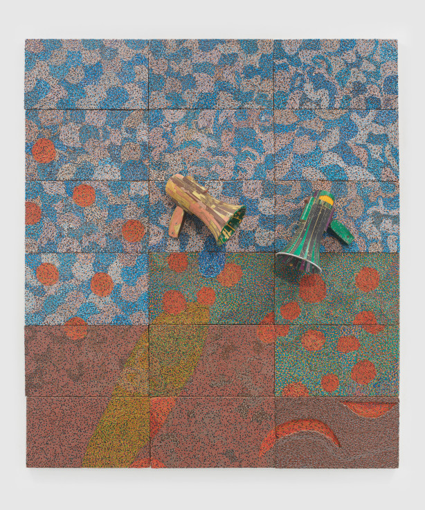 two megaphones emerging from a panel holding reclaimed electrical components forming multicolored shapes and forms