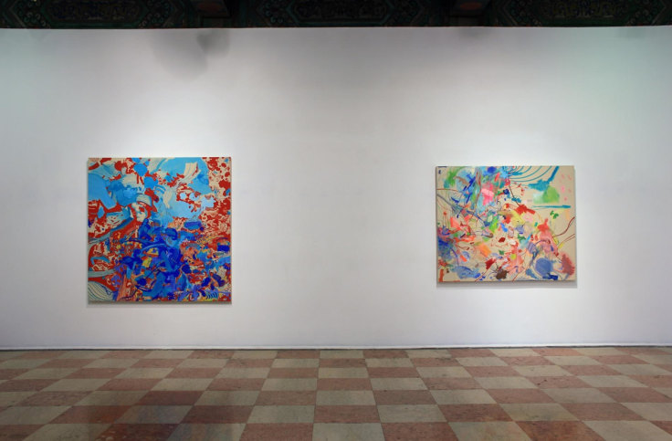 installation of two colorful abstract paintings