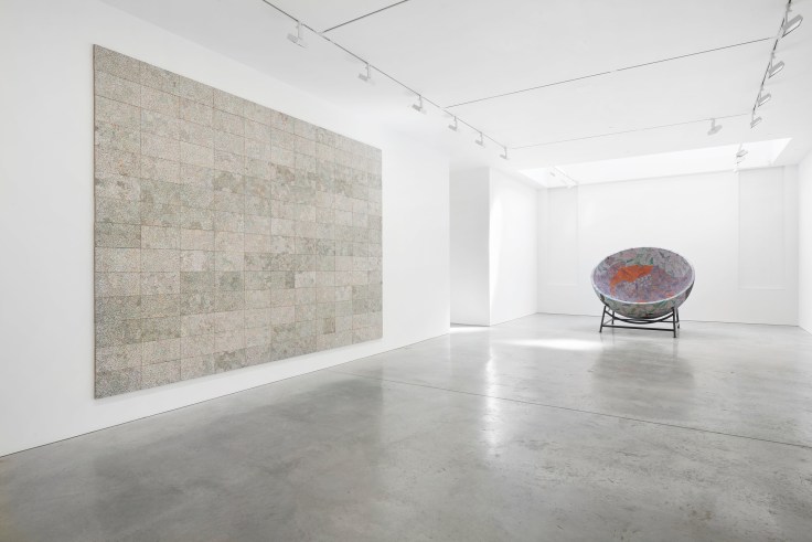 two large artworks in a long gallery