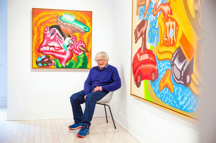 Peter Saul in front of one of his paintings at his Venus Over Manhattan exhibition