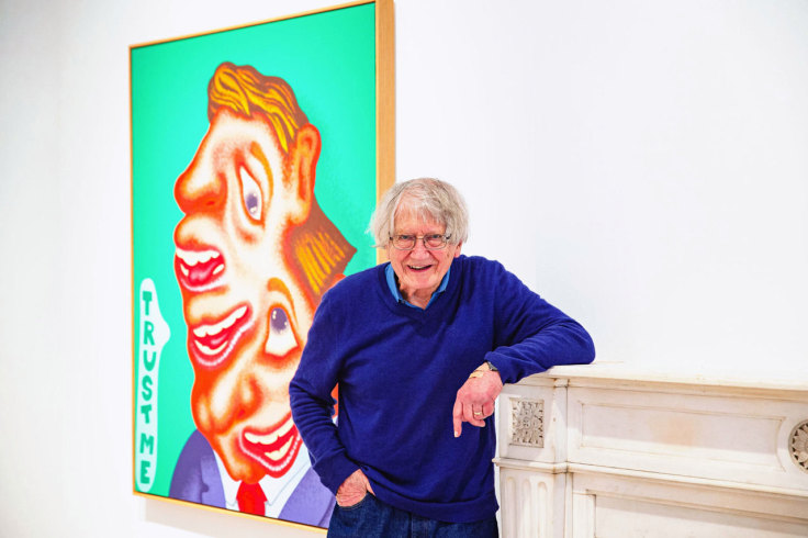 Peter Saul in front of one of his paintings at his Venus Over Manhattan exhibition