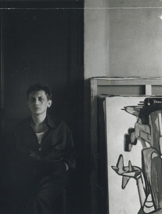 Archival photograph of Maryan in his art studio in Paris in 1955 or 1956