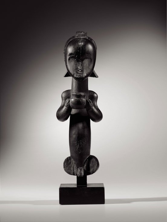 Fang Ntumu Figure, Gabon, c. 1820. Base by Kichizo Inagaki (1876-1951). Wood. Height: 15 3/8 in (39 cm)