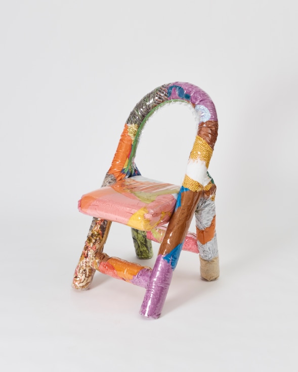 Multicolored stuffed chair by Katie Stout with fabric and vinyl