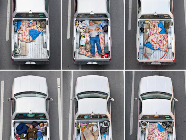 A grid shows the back of a truck with men lying down and various other objects strewn about.