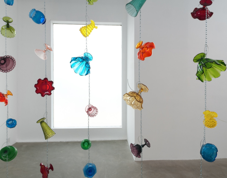 Alt="Tony Feher, (Singer of Many), 2008, 31 glass bottles with screw caps, water, food color and painted wood shelf"
