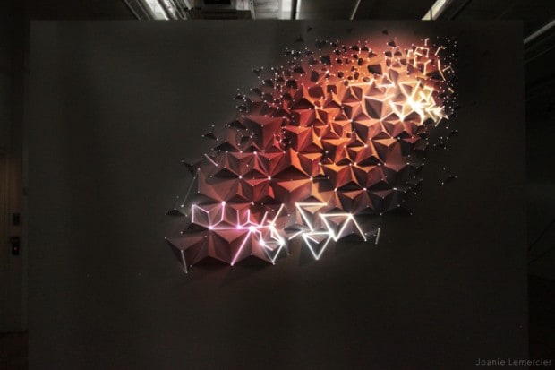 Origami paper installation with video-mapping projection