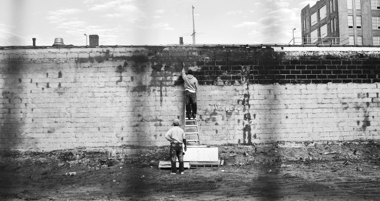 MONICA BONVICINI Untitled (two men building a wall)