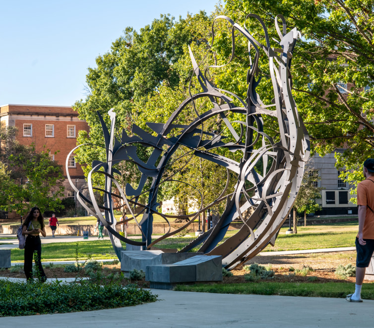 Matthew Ritchie's Shadow Garden, installed on campus, with students walking by