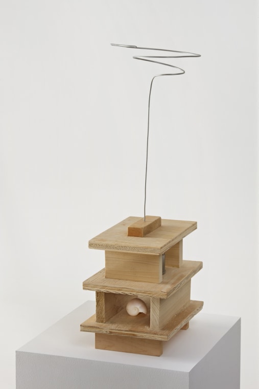 Untitled, 2011. Wood, wire, tin can and sea shell, 23 1/2 x 9 x 7 1/8 inches (59.7 x 22.9 x 18.1 cm).