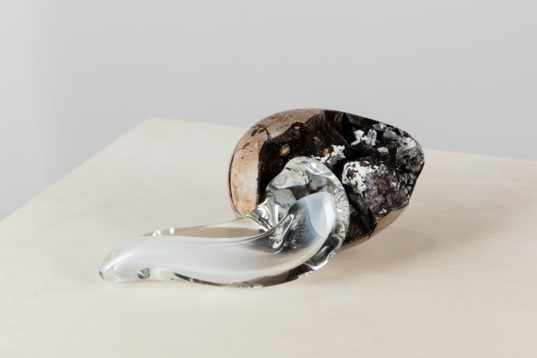 Rachel Rose, Open Egg, 2018. Rock and blown glass, 4 3/8 x 10 1/4 x 5 1/2 inches (11 x 26 x 14 cm).