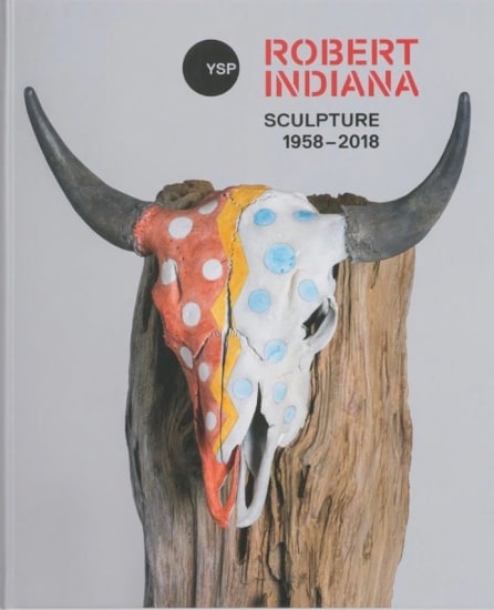 Cover of the exhibition catalogue Robert Indiana: Sculpture 1958-2018, featuring the top of his sculpture USA, with a painted animal skull