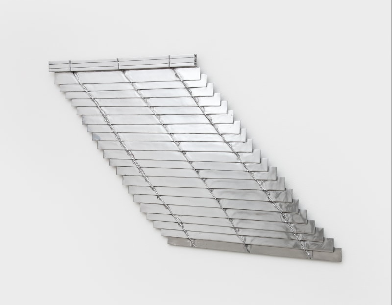 A cast aluminum sculpture by Anne Libby