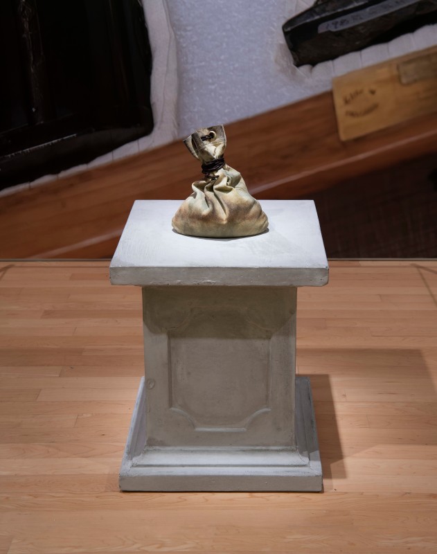 Divya Mehra, &quot;There is nothing you can possess which I cannot take away (Not Vishnu: New Ways of Dars&aacute;na),&quot; 2020, coffee, sand, chamois, leather cord, metal, British cast stone pedestal, dimensions variable