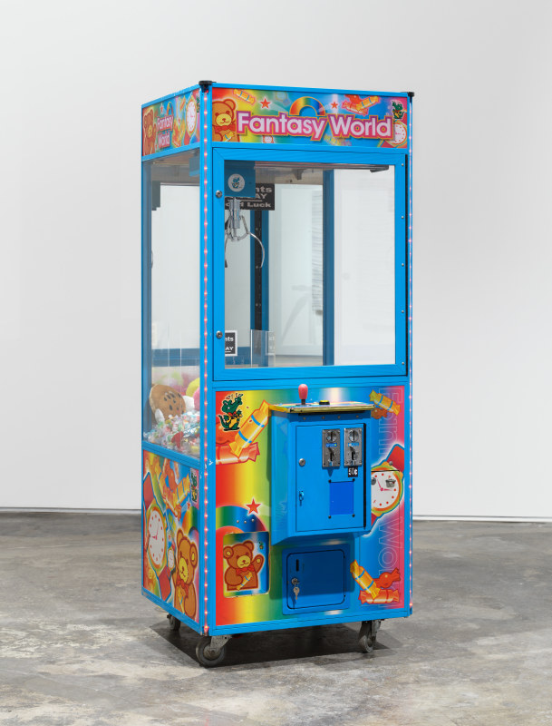 Fantasy World, 2023,&nbsp;claw machine, various toys, and candy,&nbsp;75 3/4 x 31 x 34 1/4 in (192.4 x 78.7 x 87 cm)