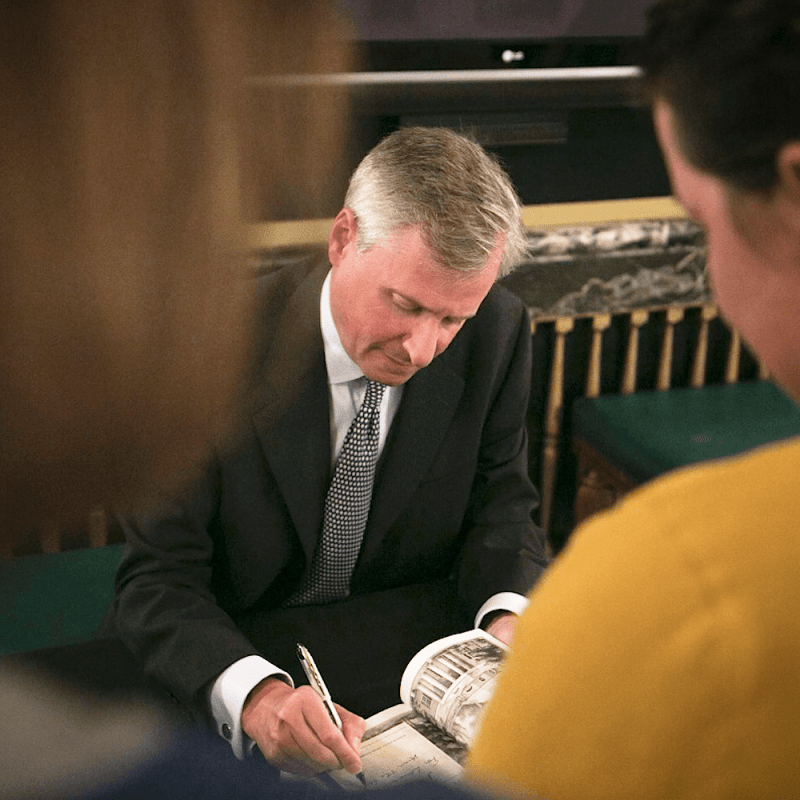 Jon Meacham autographs a copy of his book,&amp;nbsp;Thomas Jefferson: The Art of Power,

in the lobby of the Missouri Theatre.