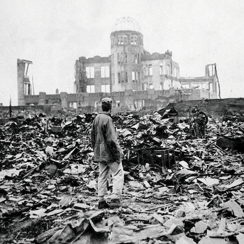 A man walks through the destruction in Hiroshima.