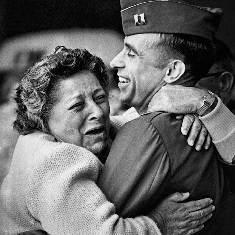 Ernest Fer embraces her son Captain John Fer, after he was held in captivity by the North Vietnamese for more than six years.