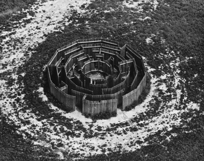 Black and white photo of the outdoor site-specific 1972 sculpture Maze by Alice Aycock
