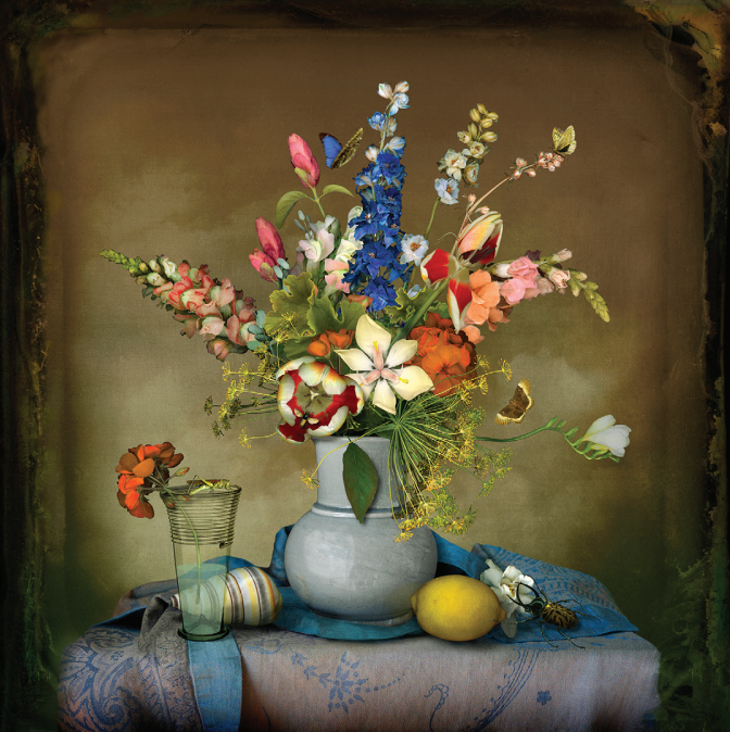 A colorful bouquet of flowers in a grey vase