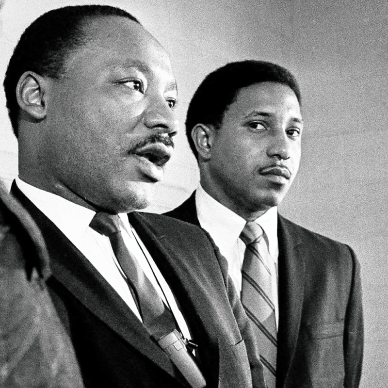 Dr. Martin Luther King, accompanied by Rev. Bernard Lafayette, talks about a planned march on Washington, during a news conference in Atlanta. 1968.