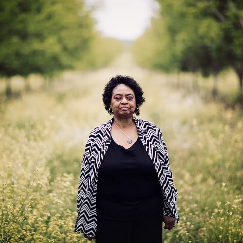 Shirley Sherrod, Executive Director of the Southwest Georgia Project standing in a

pecan orchard in Dougherty County, Georgia, May, 2019.&amp;nbsp;