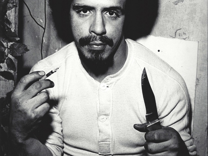 Man with knife by Arlene Gottfried