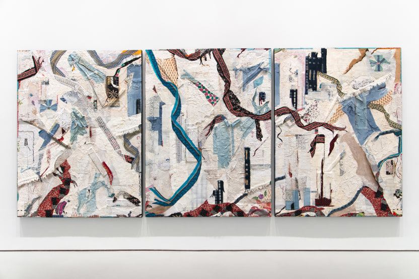 Abstract composition consisting of three parallel canvas panels featuring collaged textiles, paint, and cardboard.