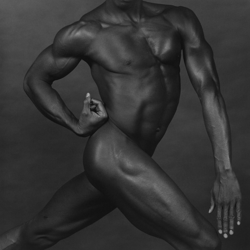 Nude figure study of man lunging.