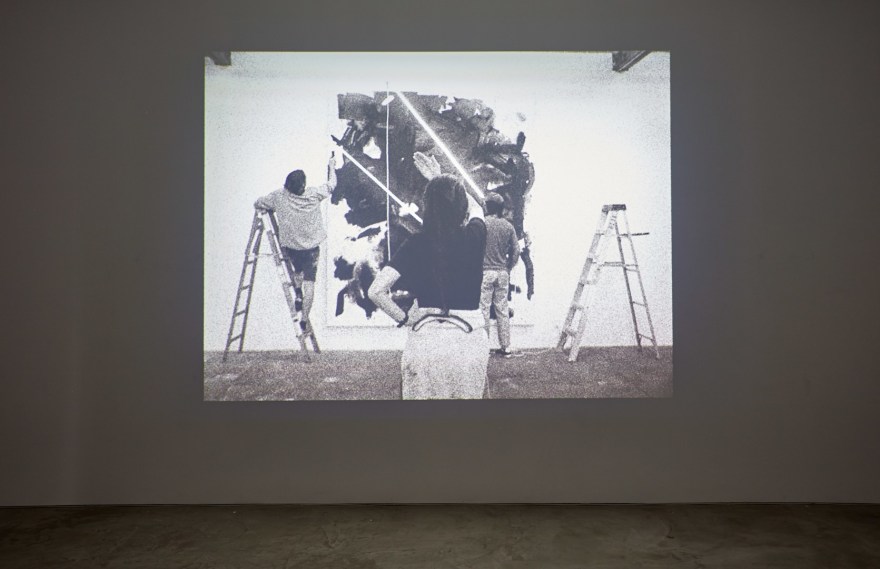 with it which it as it if it is to be, Film still, Installation view