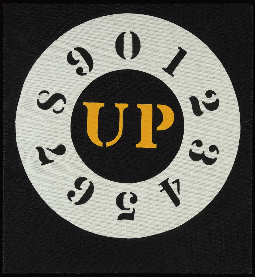 Up is a 12 by 11 inch canvas with a circle on a black background. In the middle of the circle is the word UP, painted in yellow stenciled letters. The star is surrounded by a white ring containing the black numerals going clockwise from zero at the top though nine.