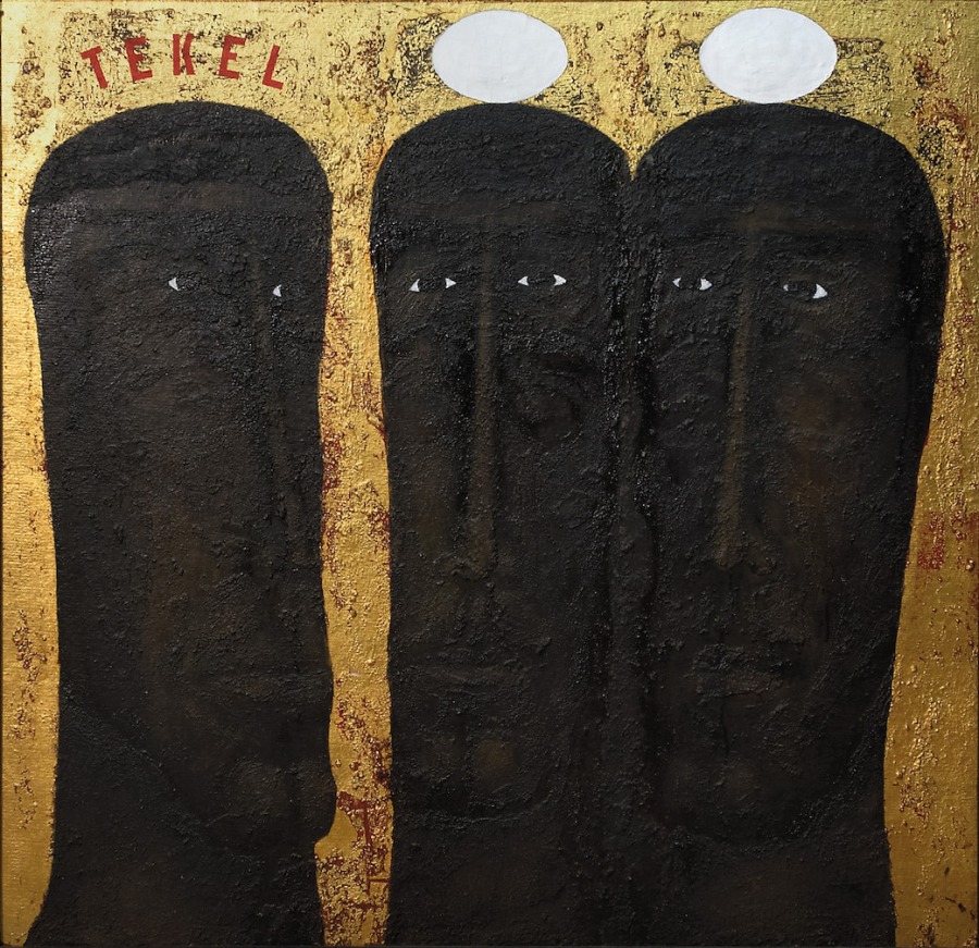 Painting of three expressionistic heads on a gold background. The word "Tekel" is written in red above the head at the left, and there is a white oval painted above each of the other two heads.