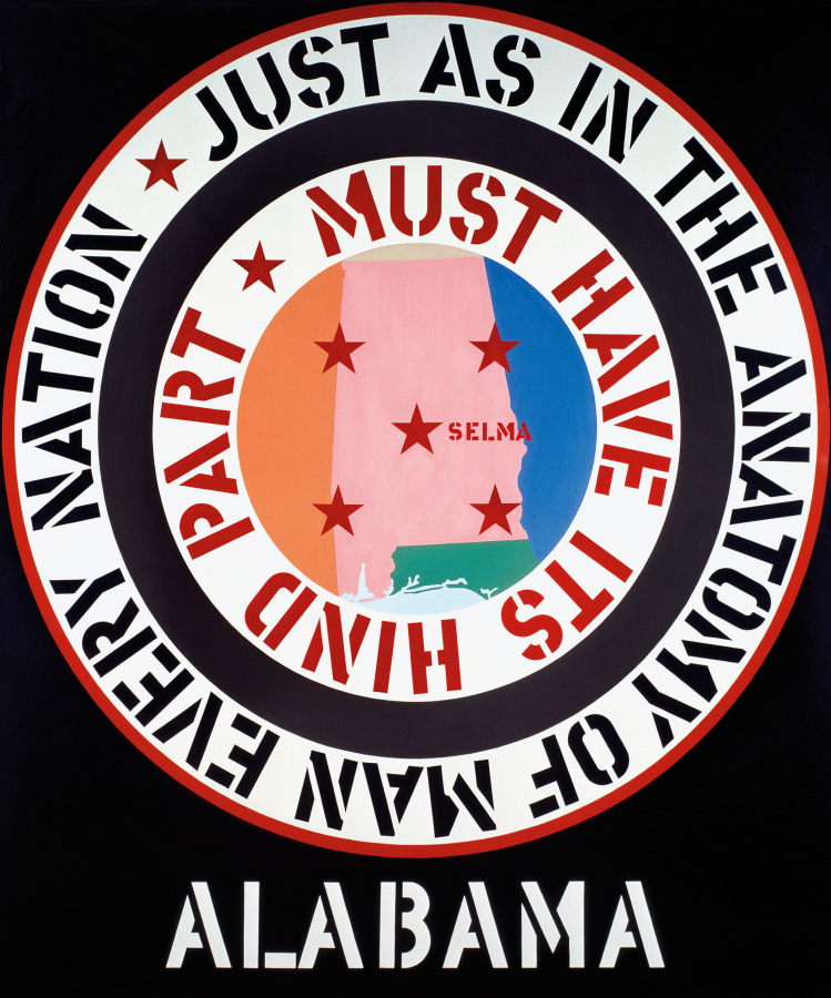 A 70 by 60 inch black canvas with the title, Alabama, painted in white stenciled letters across the center bottom edge of the painting. Above the title and dominating the canvas is a large circle consisting of a pink image of the state of Alabama, with Selma shown on the map. Around this image is a white ring with stenciled red text surrounded by a black ring and another white ring with black stenciled text. The text reads, starting in the outer ring, "Just as in the anatomy of man every nation," and in the inner ring "must have its hind part."