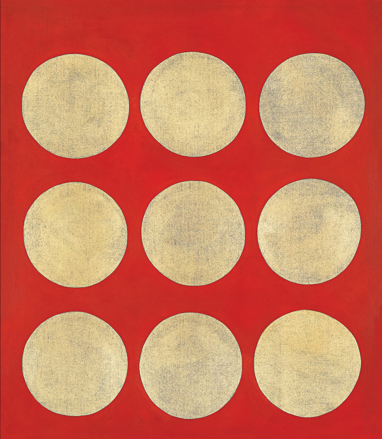 A red painting with three horizontal rows of three golden orbs