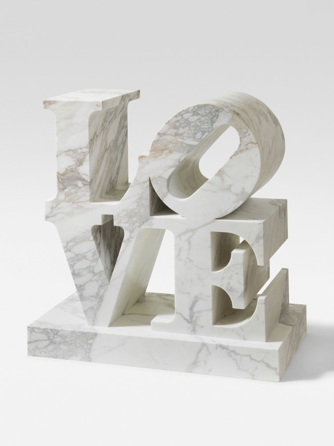 LOVE is a 44 11/16 by 44 5/8 by 25 white marble sculpture with the letters L and a tilted O stacked above the letters V and E.