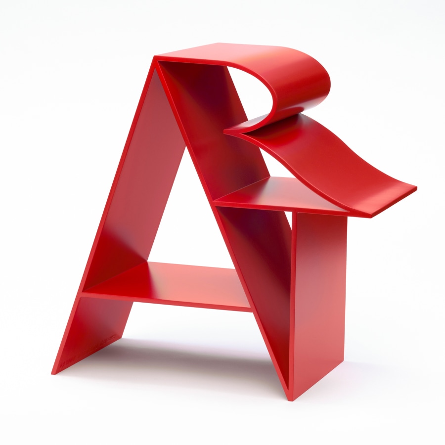 Art, an 18 by 18 by 9 inch red polychrome aluminum sculpture. The letter "A” forms a supporting structure that the “R” and “T” lean against.