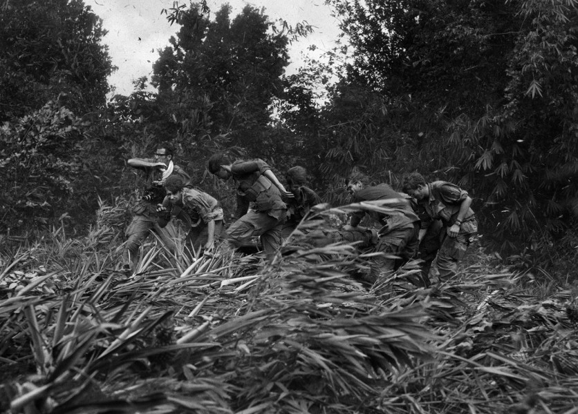 Henri Huet- Life Magazine Photographer Larry Burrows Struggles Through Elephant Grass