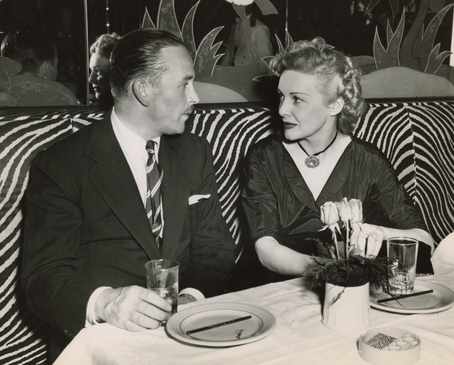 ANONYMOUS PRESS PHOTO OF MADELEINE CARROLL AND BRIAN AHERNE AT EL MOROCCO NIGHT CLUB, C. 1950